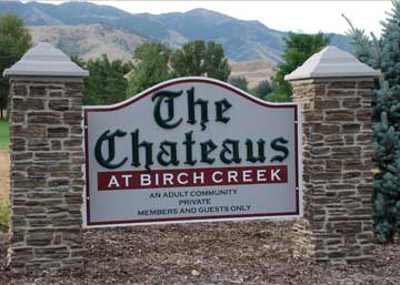 Large Stone Faux Pillars with Sign